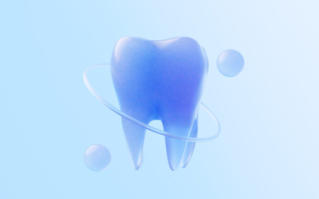 Tooth with glass material