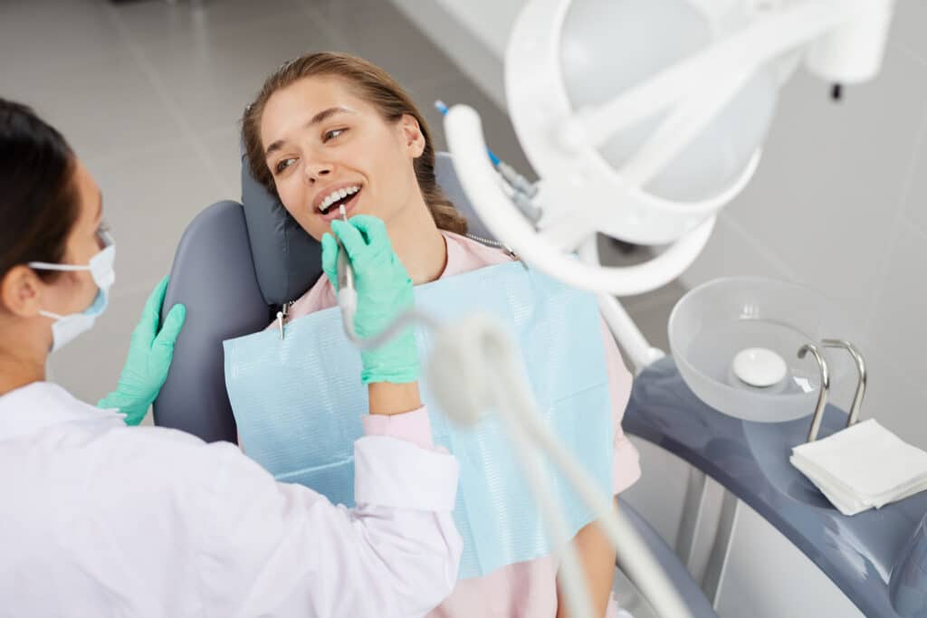 Young woman at dental exam 545472